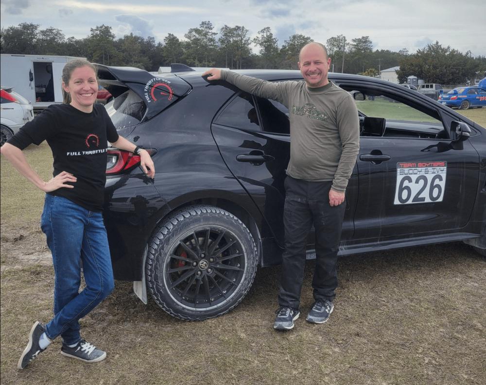 Ivy Boyter, Founder of Full Throttle SEO, with husband at Rallycross in Florida