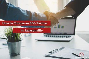 image of hands shaking on partnership in front of laptop as hero image with banner saying "how to choose an SEO partner in Jacksonville"